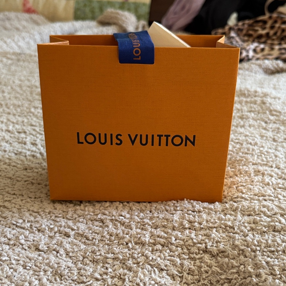 Louis Vuitton Orange small bag with Blue Ribbon Pull